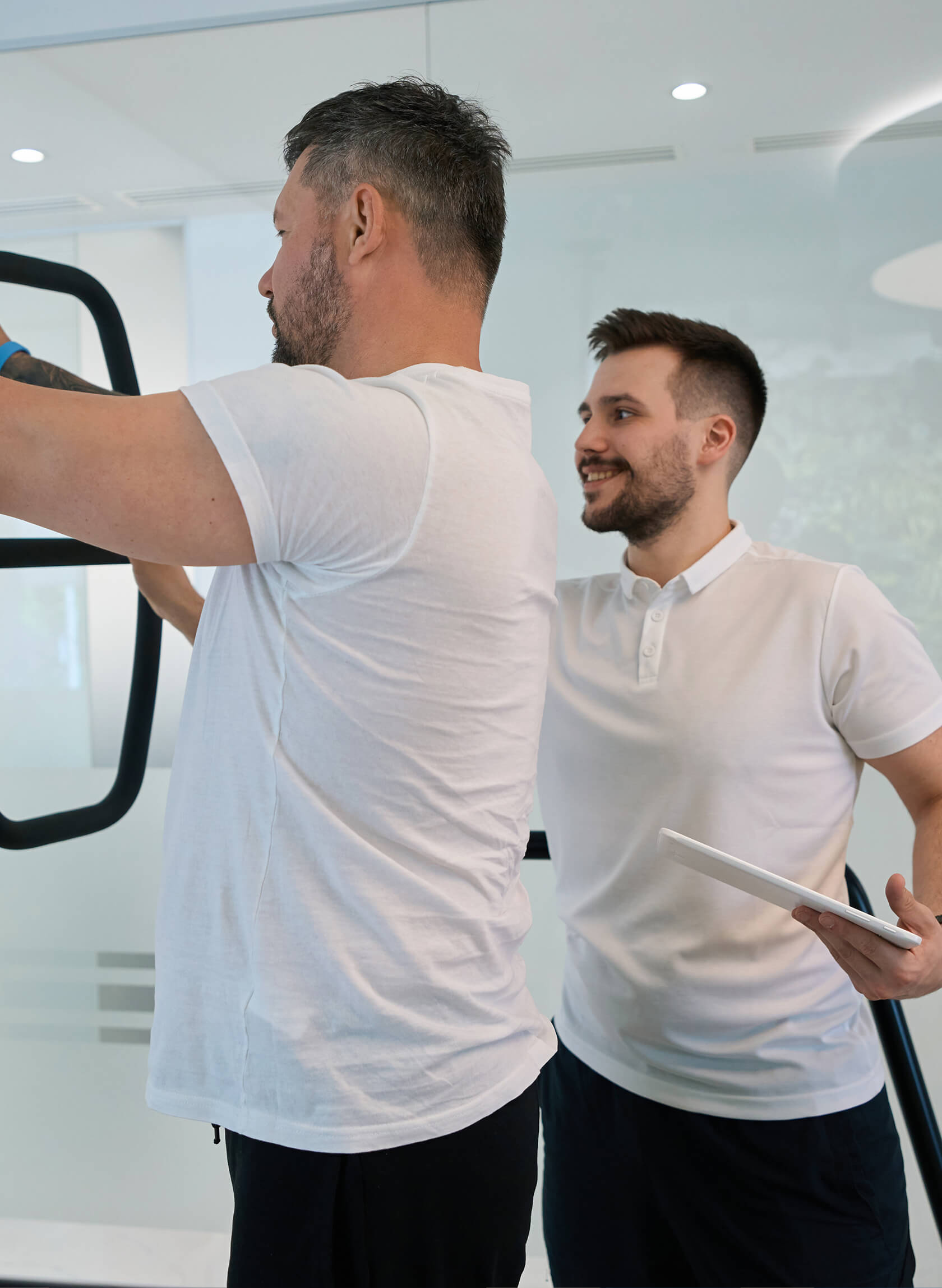 Rehabilitation specialist measuring a patient's health.