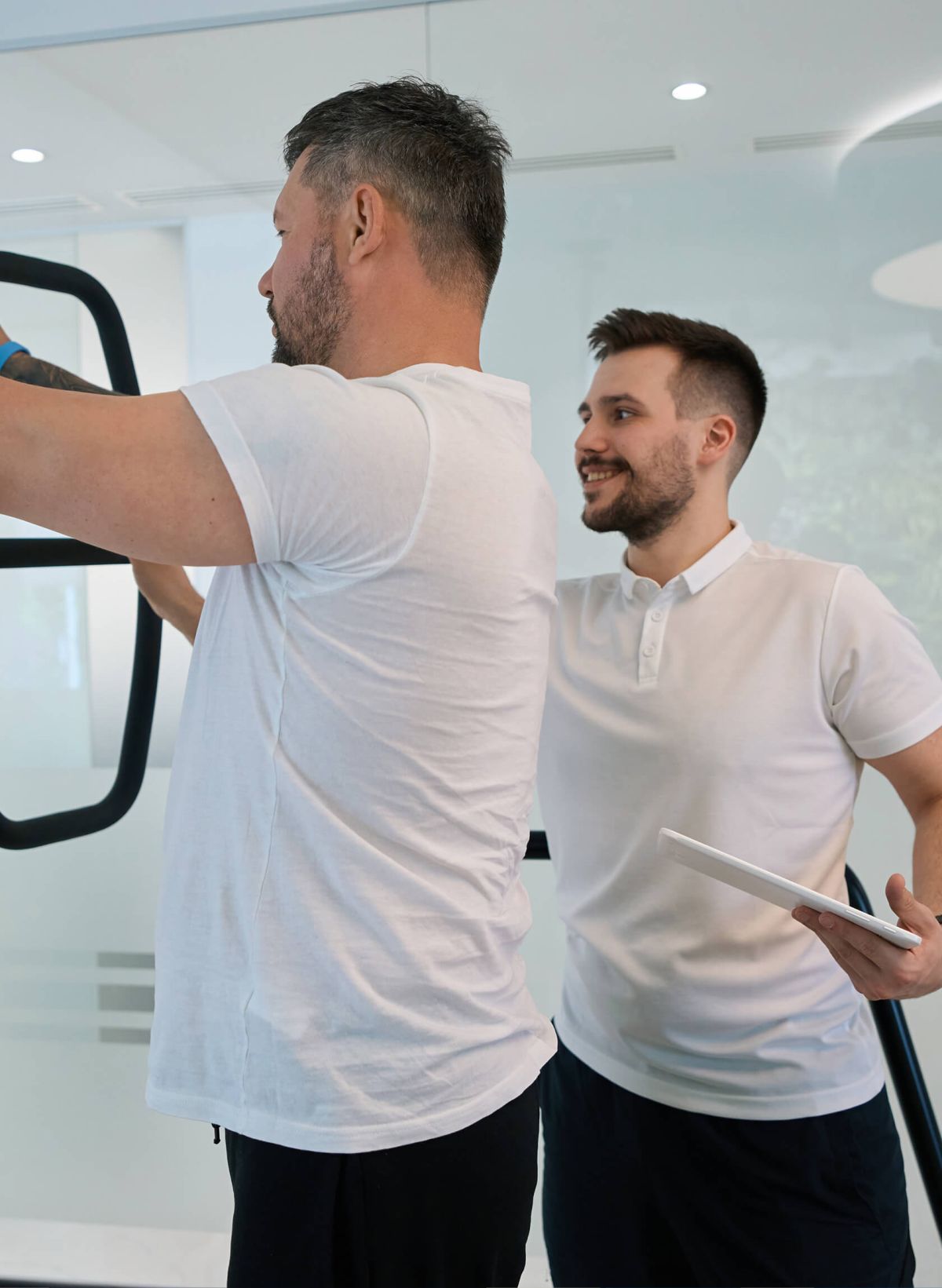 Rehabilitation specialist measuring a patient's health.